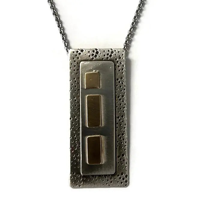 Silver pendant with textured surface and embedded 14K gold fill rectangles