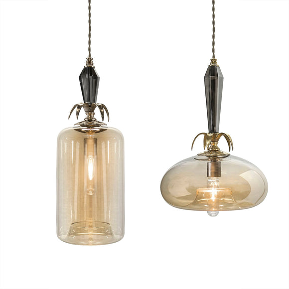 Luna Bella Ledesma Round or Cylinder Pendant Lamps with Amber Colored Glass and Leaded Smoke Crystal Column and Brass Details Artistic Artisan Designer Pendant lamps