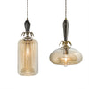 Luna Bella Ledesma Round or Cylinder Pendant Lamps with Amber Colored Glass and Leaded Smoke Crystal Column and Brass Details Artistic Artisan Designer Pendant lamps