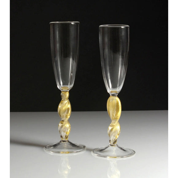 https://www.sweetheartgallery.com/cdn/shop/collections/Frost-Glass-Clear-And-Gold-Champagne-Glasses-Artistic-Functional-Artisan-Handblown-Art-Glass_580x.jpg?v=1579642214