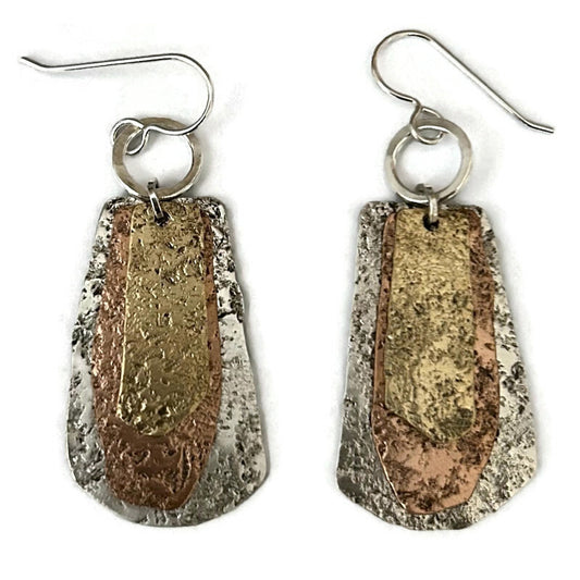 Sterling silver, copper, and 14K gold fill earrings with textured metallic design
