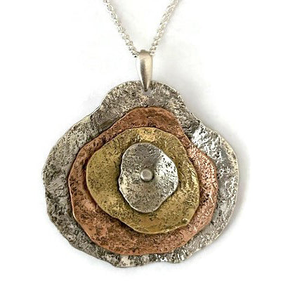 Sterling silver, copper, and 14K gold fill textured pendant freeform necklace.