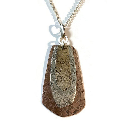 Hammered and textured sterilng silver, copper, and 14K gold fill pendant necklace