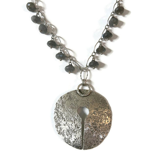 Necklace with a textured sterling silver round pendant, and a chain with a choice of labradorite, Chalcedony, turquoise, or Moonstone drops