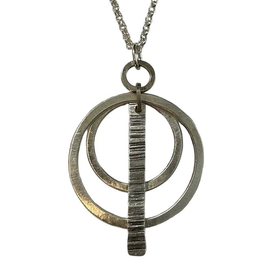 Sterling silver necklace with a unique  circular pendant 