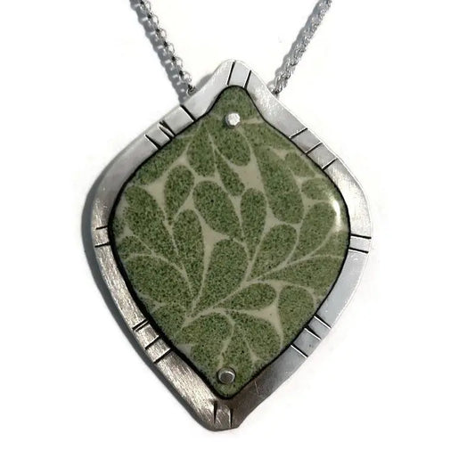 Sterling silver and enamel pendant available with different patterns and colors. 