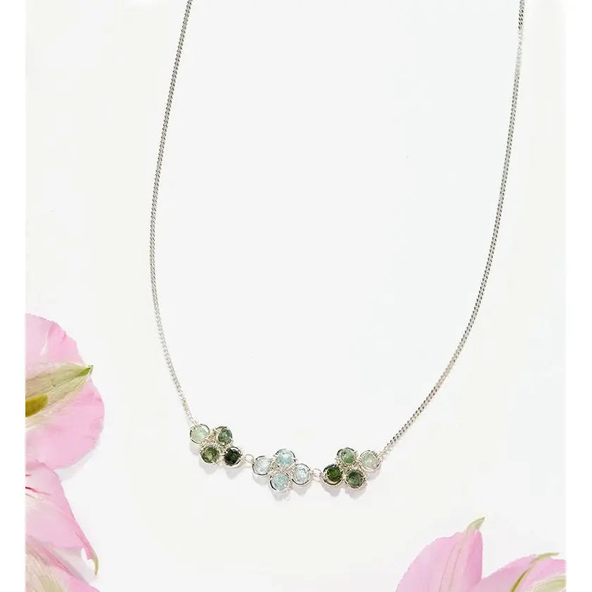 Green tourmaline and blue zircon clover necklace