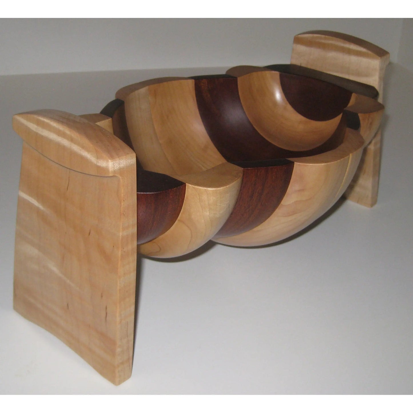 Tom Perez Turned  Laminated Mahogany and Maple Seed Pod Vessel