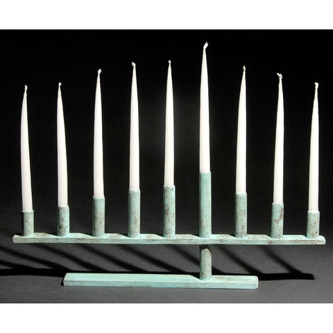 Cantilever Menorah shown in blue green