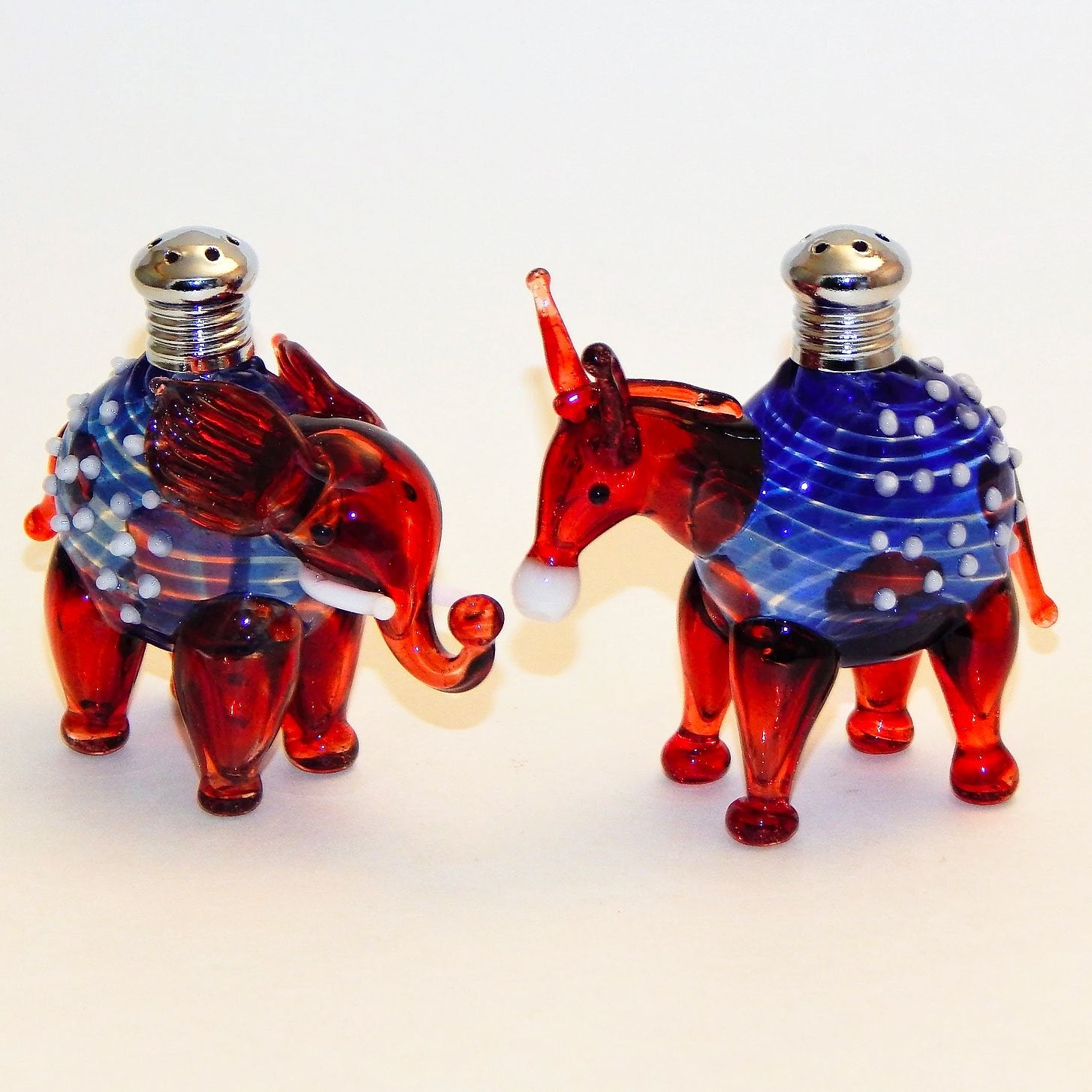 https://www.sweetheartgallery.com/cdn/shop/products/Four-Sisters-Art-Glass-Donkey-and-Elephant-Mix-and-Match-275-Salt-and-Pepper-Shaker-Artistic-Handblown-Glass-Salt-and-Pepper-Shakers.jpg?v=1589924245