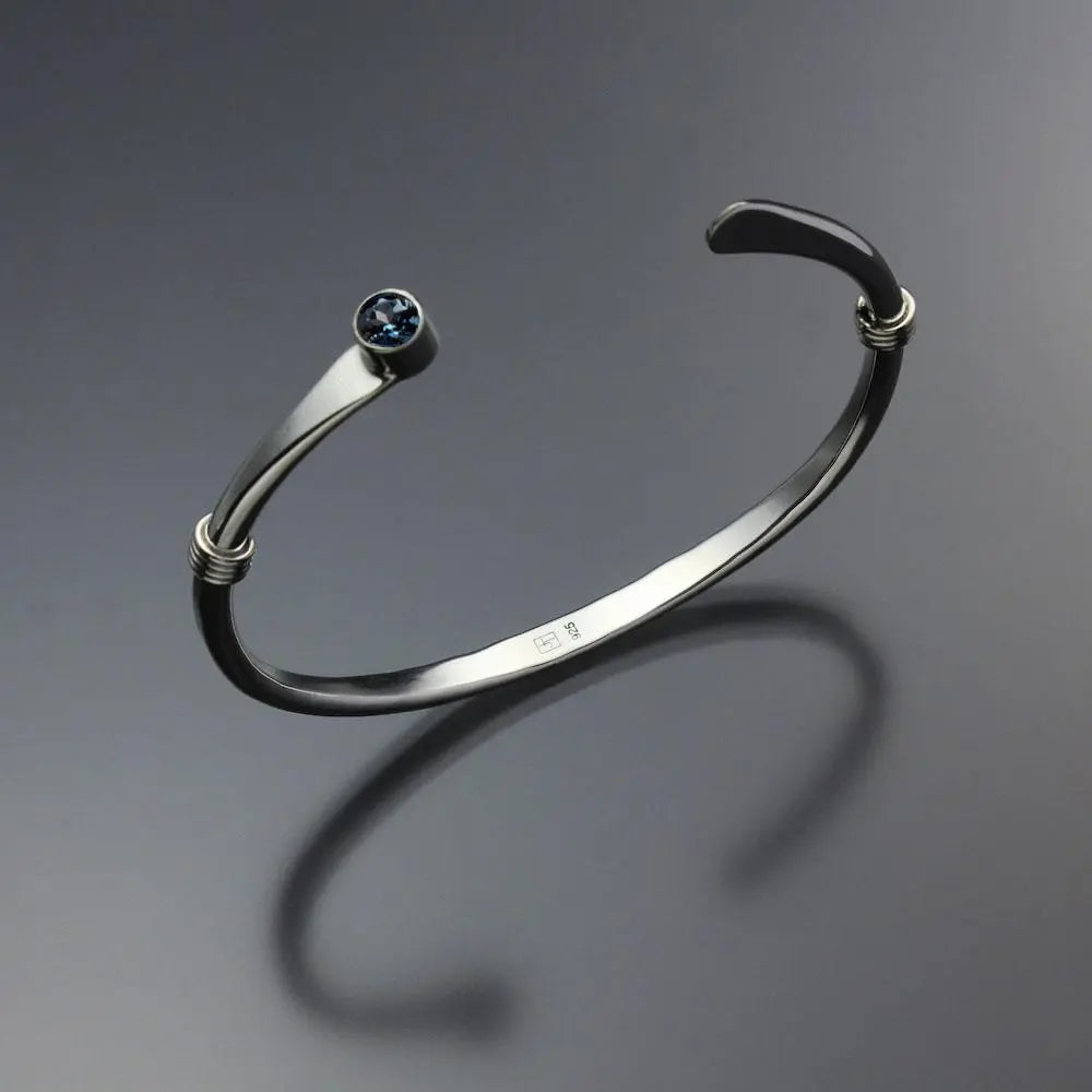John Tzelepis Jewelry Sterling Silver London Blue Topaz Bracelet BRA021WLTZ-1 Handcrafted Artistic Artisan Designer Jewelry