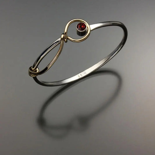 John Tzelepis Jewelry Sterling Silver and 14K Gold Garnet Bracelet BRA521GR-5 Handcrafted Artistic Artisan Designer Jewelry