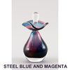 J. Steel Blue and Magenta Perfume bottle