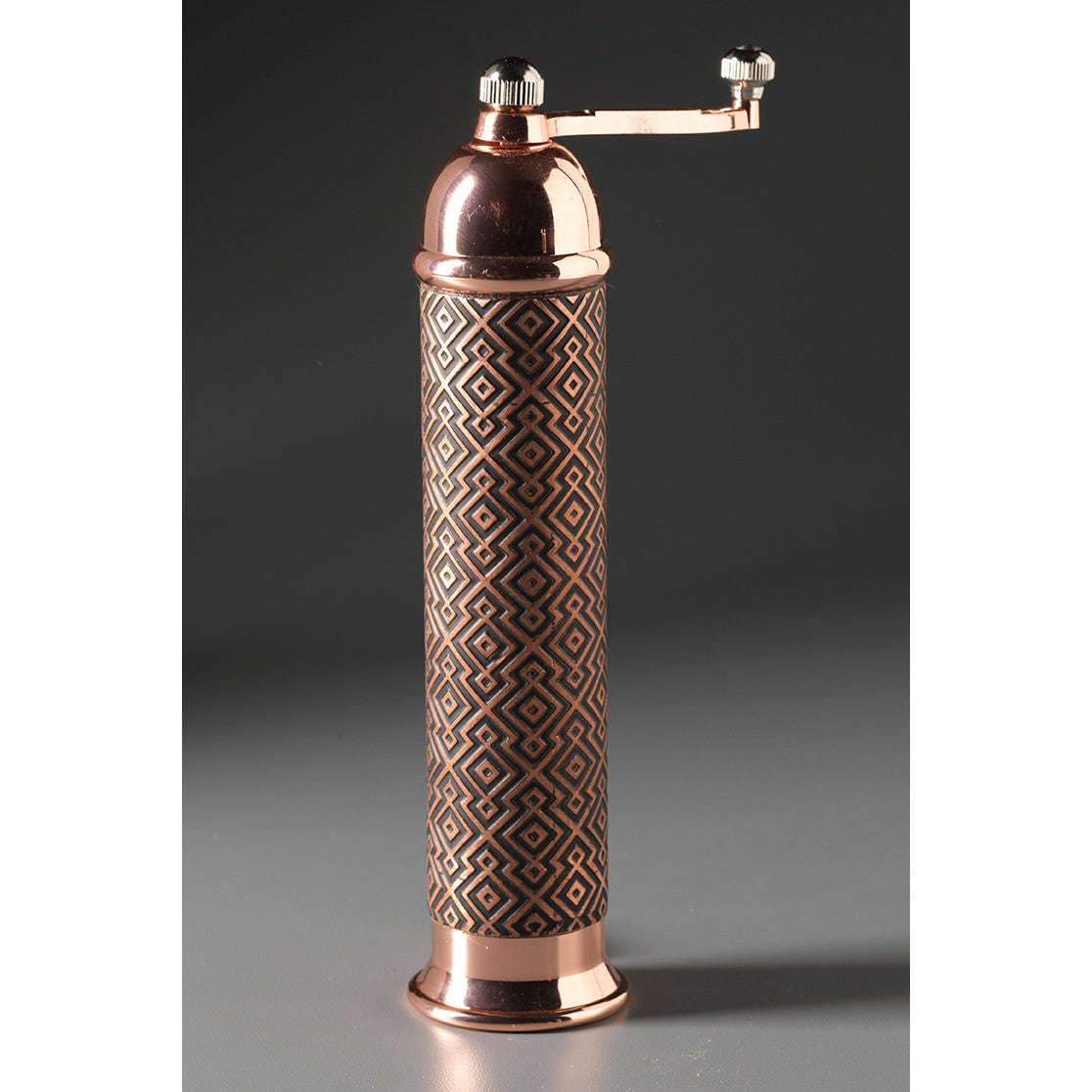 https://www.sweetheartgallery.com/cdn/shop/products/Raw-Design-Copper-and-Black-Metal-Pepper-Mill-Grinder-Aztec-Copper-by-Robert-Wilhelm-Artistic-Designer-Salt-and-Pepper-Shakers.jpeg?v=1590180486