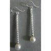 Richelle Leigh Sterling Silver Long Modern Twist Pearl Earrings ER06SS Artistic Designer Handcrafted Jewelry