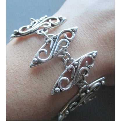Richelle Leigh Sterling Silver Swirl Bracelet BL31SS Artistic Designer Handcrafted Jewelry