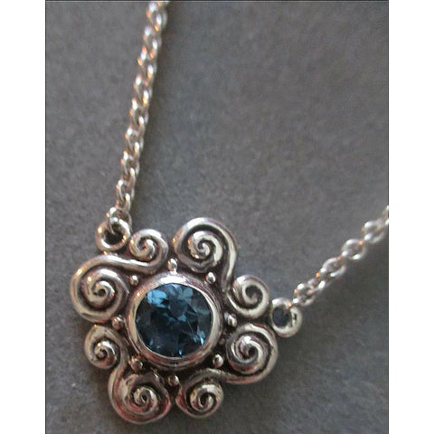 Richelle Leigh Sterling Silver Swiss Blue Topaz Swirl Pendant Necklace PDT24SST Artistic Designer Handcrafted Jewelry