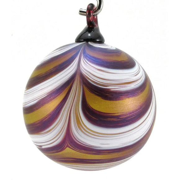 The Furnace Glassworks Ribbon Ornament Shown In Splash of Gold Artisan Handblown Art Glass Ornaments