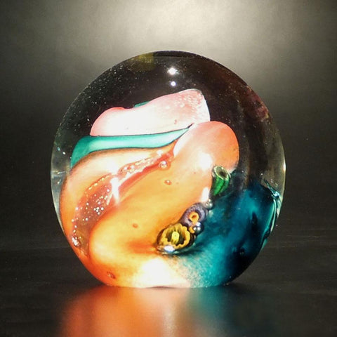 The Glass Forge Lagoon Undersea Paperweight Shown in Salmon Artistic Functional Artisan Handblown Art Glass Paperweights