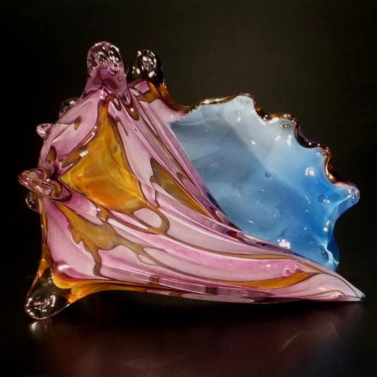 The Glass Forge Seashell Shown in Blue Topaz And Purple Artistic Artisan Handblown Art Glass
